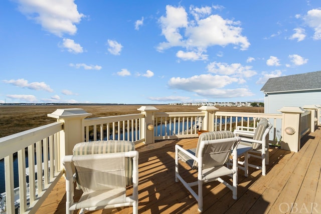 deck featuring a water view