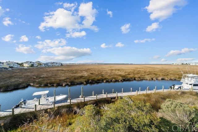 view of dock with a water view