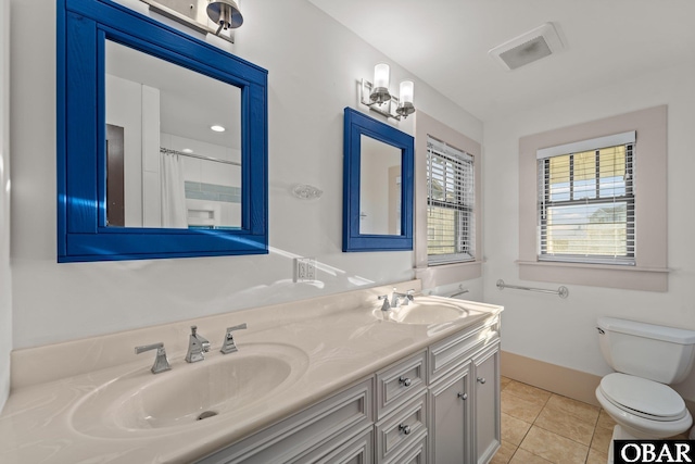 27206 Sea Chest Ct Lot 27, Salvo, NC 27972 - bathroom featuring double vanity, toilet, tile patterned flooring, baseboards, and curtained shower