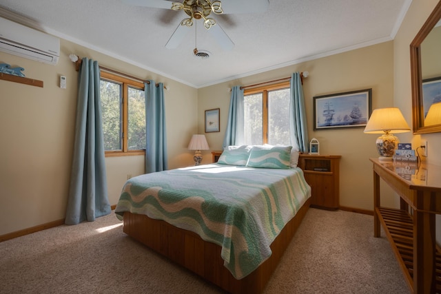 bedroom featuring crown molding, a wall unit AC, baseboards, and light colored carpet