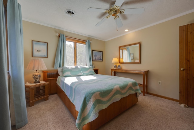 bedroom with light colored carpet, visible vents, and crown molding