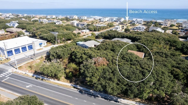 aerial view featuring a water view and a residential view