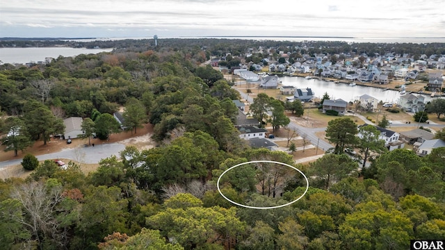 aerial view with a water view and a residential view