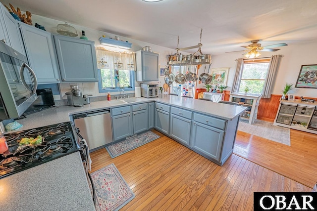 40191 Kiddy Ln Lot 13, Avon, NC 27915 - kitchen with appliances with stainless steel finishes, plenty of natural light, light countertops, and light wood-style flooring