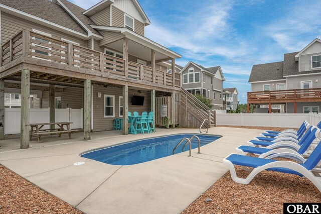 655 Pampas Ct Lot 162, Corolla, NC 27927 - view of pool with a patio, a deck, and stairway