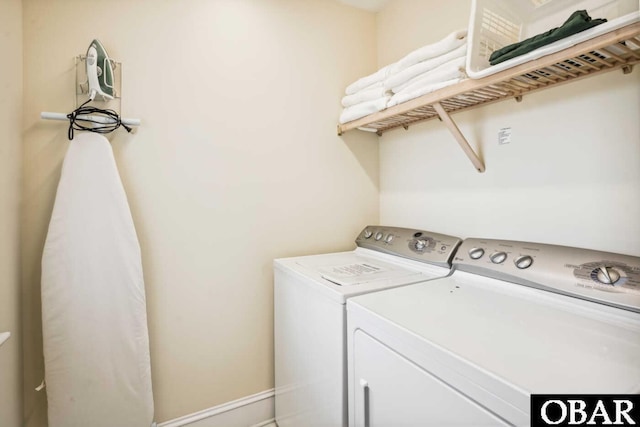 laundry area featuring laundry area and separate washer and dryer