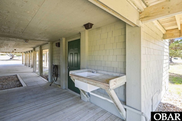 wooden terrace with a sink