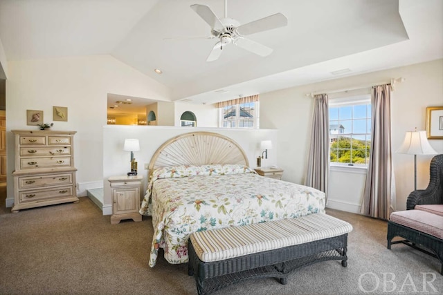 bedroom with lofted ceiling, ceiling fan, baseboards, and light colored carpet