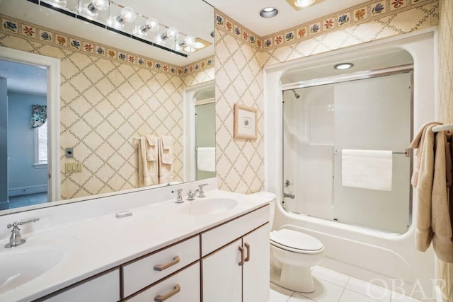 full bathroom featuring enclosed tub / shower combo, a sink, and wallpapered walls