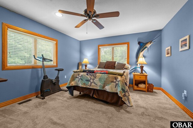 294 Hillcrest Dr Lot 20, Southern Shores, NC 27949 - carpeted bedroom featuring baseboards and a ceiling fan