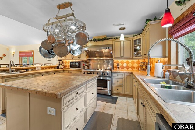 294 Hillcrest Dr Lot 20, Southern Shores, NC 27949 - kitchen with a sink, range hood, high end stainless steel range, and plenty of natural light