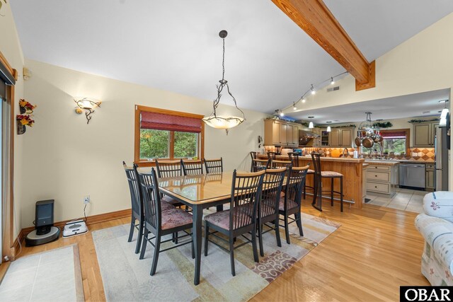 294 Hillcrest Dr Lot 20, Southern Shores, NC 27949 - dining room featuring light wood-type flooring and rail lighting