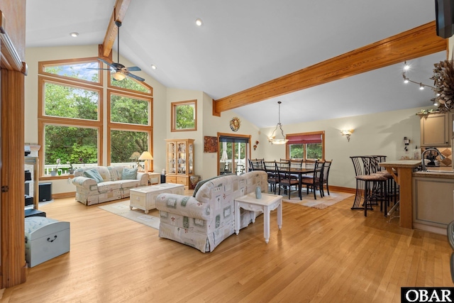 294 Hillcrest Dr Lot 20, Southern Shores, NC 27949 - living area featuring beamed ceiling, light wood-type flooring, a ceiling fan, a fireplace, and baseboards
