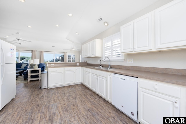 841 Golden Bluff Way Lot 336, Corolla, NC 27927 - kitchen with white appliances, a sink, a ceiling fan, wood finished floors, and white cabinets
