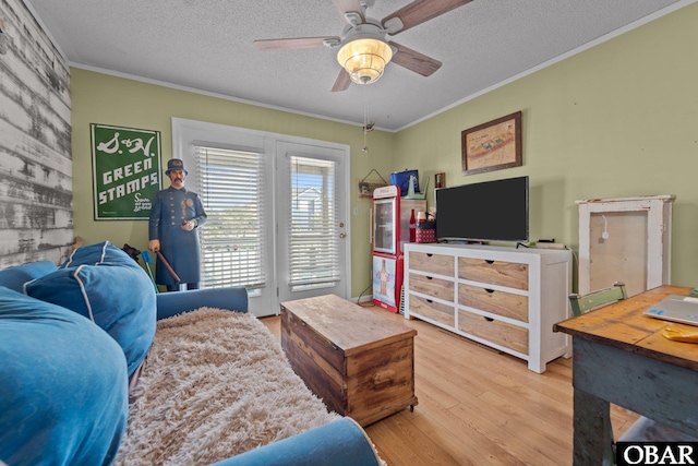 4121 W Whispering Winds Ct Lot 17, Nags Head, NC 27959 - bedroom with crown molding, access to outside, wood finished floors, a textured ceiling, and ceiling fan