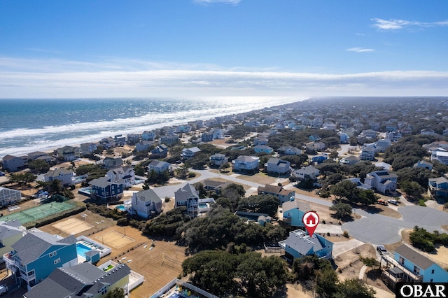 bird's eye view featuring a beach view and a water view