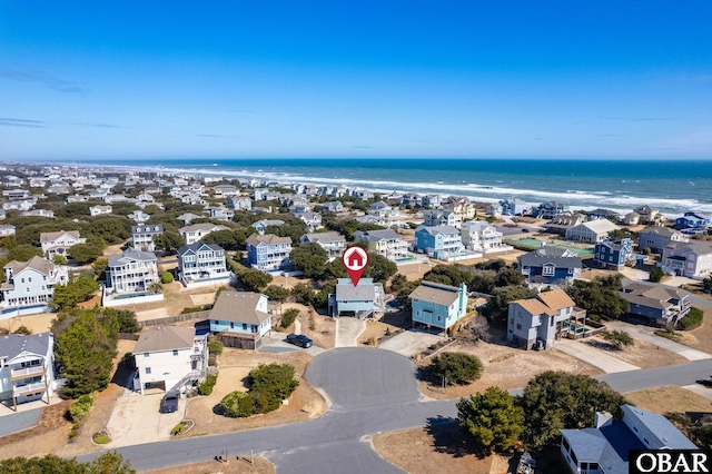 aerial view with a residential view and a water view