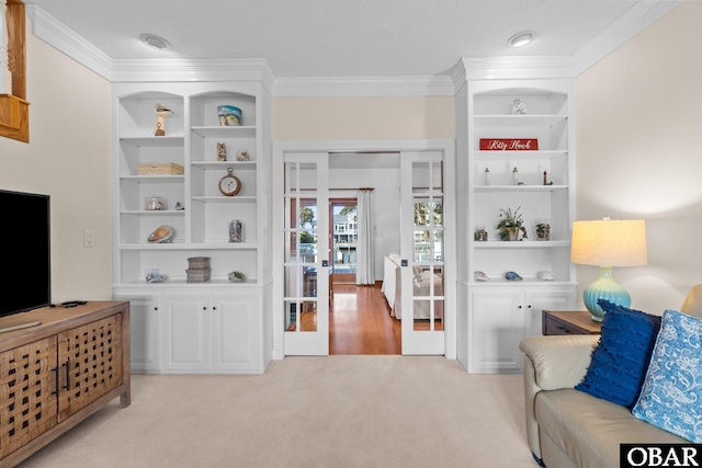 living area featuring ornamental molding, light carpet, and built in features