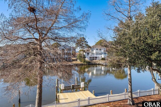 view of dock with a water view and boat lift