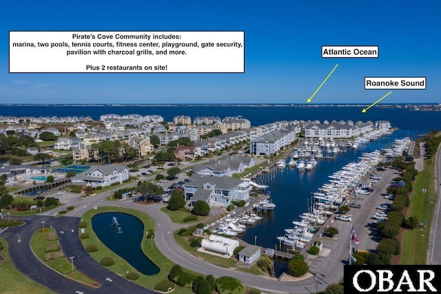 424 Pirates Way Unit 424A, Manteo, NC 27954 - bird's eye view featuring a water view and a residential view