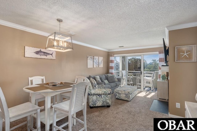 424 Pirates Way Unit 424A, Manteo, NC 27954 - carpeted dining space featuring a chandelier, crown molding, and a textured ceiling