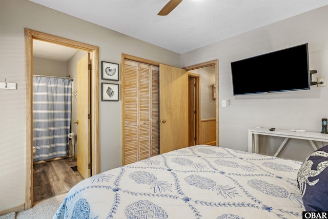 bedroom with a ceiling fan, a closet, a textured ceiling, and ensuite bathroom