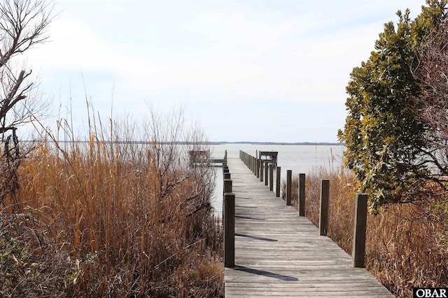 view of dock with a water view