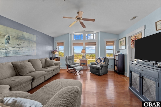 100F Mercedes Ct Unit F, Grandy, NC 27939 - living room featuring vaulted ceiling, a ceiling fan, and wood finished floors