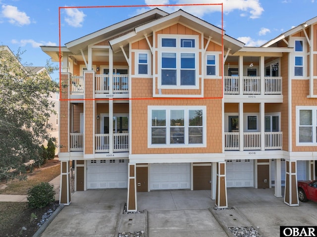 100F Mercedes Ct Unit F, Grandy, NC 27939 - view of front of home with an attached garage and driveway