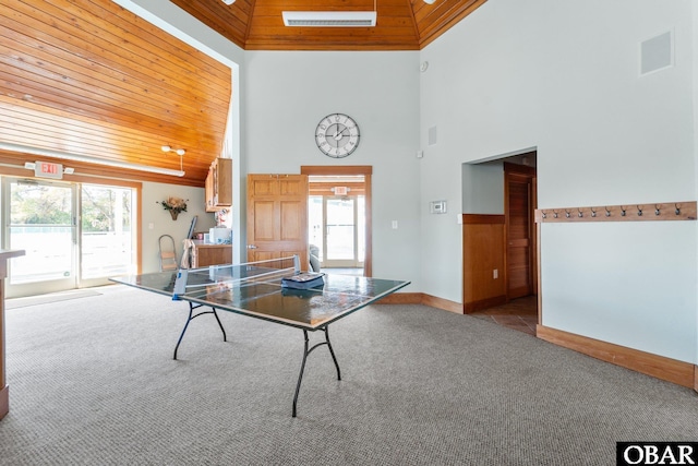 100F Mercedes Ct Unit F, Grandy, NC 27939 - playroom featuring a towering ceiling, wooden ceiling, carpet, and baseboards