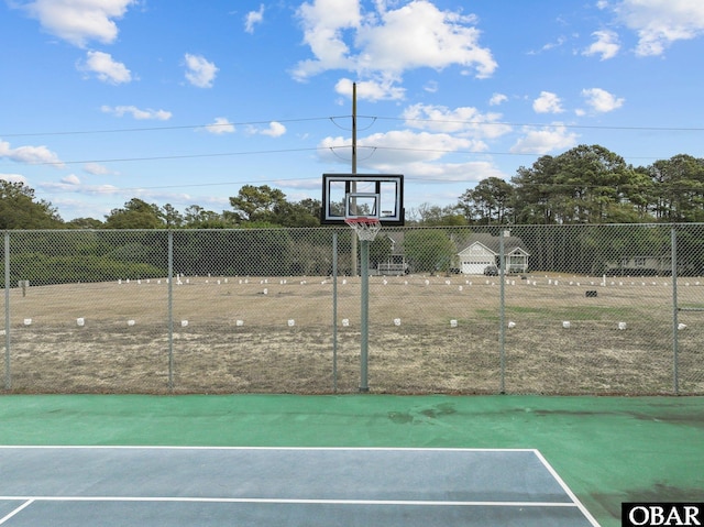 view of sport court featuring community basketball court and fence