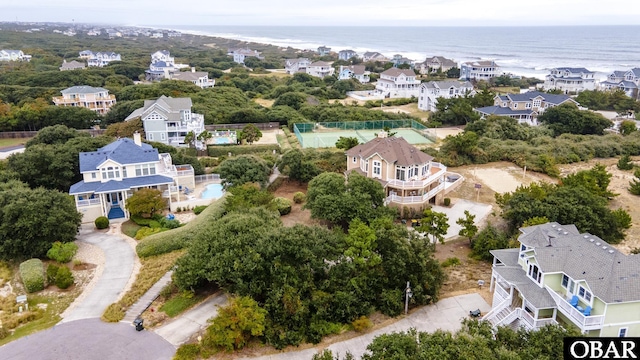 bird's eye view featuring a water view and a residential view