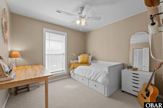 410 W Wilkinson St Lot 26-28, Kill Devil Hills, NC 27948 - carpeted bedroom with ceiling fan and arched walkways