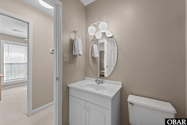 410 W Wilkinson St Lot 26-28, Kill Devil Hills, NC 27948 - bathroom with toilet and vanity