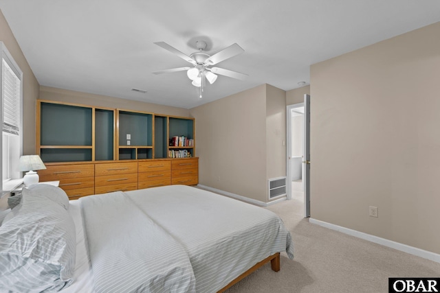 410 W Wilkinson St Lot 26-28, Kill Devil Hills, NC 27948 - bedroom with light carpet and ceiling fan