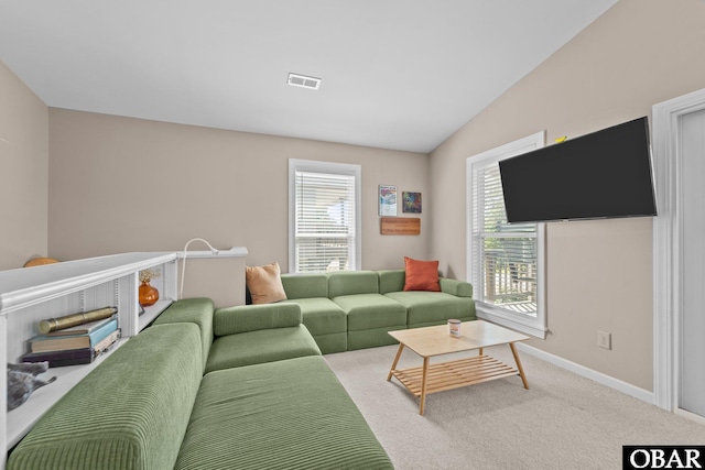 410 W Wilkinson St Lot 26-28, Kill Devil Hills, NC 27948 - living area with lofted ceiling and carpet floors