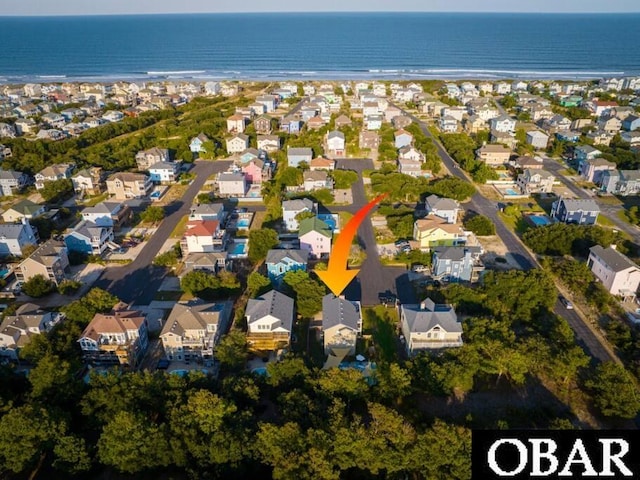 aerial view with a water view and a residential view