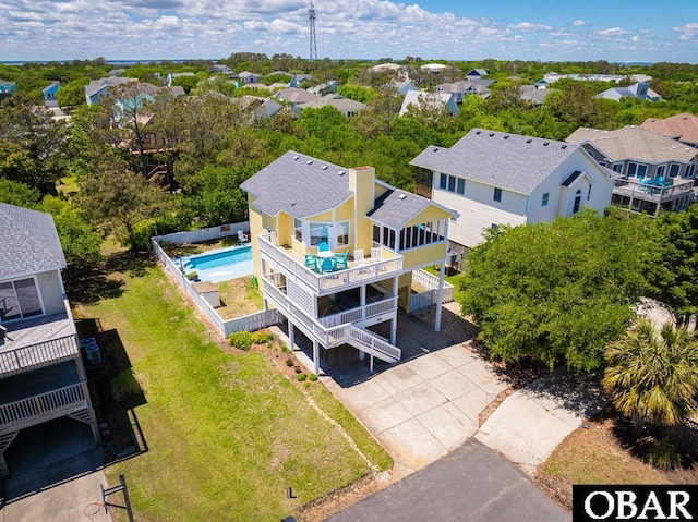 birds eye view of property with a residential view