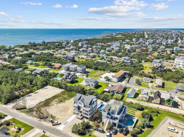 aerial view with a water view and a residential view