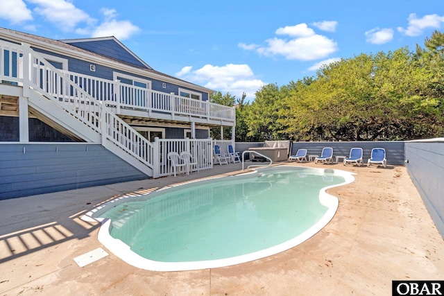 1017 Corolla Dr Lot 52, Corolla, NC 27927 - view of swimming pool with a deck, a patio, stairway, and fence