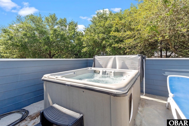 1017 Corolla Dr Lot 52, Corolla, NC 27927 - view of patio / terrace with a hot tub