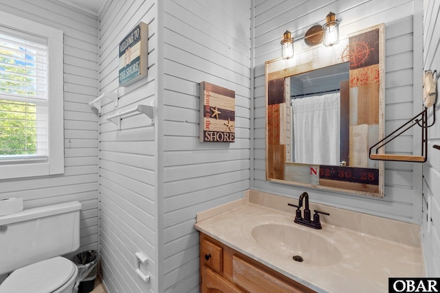 1017 Corolla Dr Lot 52, Corolla, NC 27927 - full bathroom with toilet, vanity, and wood walls