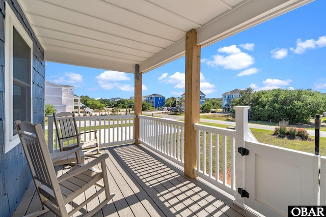 1017 Corolla Dr Lot 52, Corolla, NC 27927 - deck with a residential view and covered porch