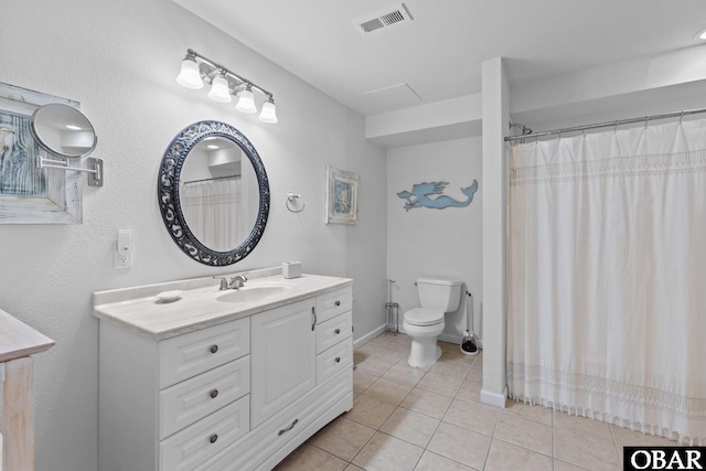 1017 Corolla Dr Lot 52, Corolla, NC 27927 - bathroom featuring vanity, tile patterned flooring, toilet, and baseboards