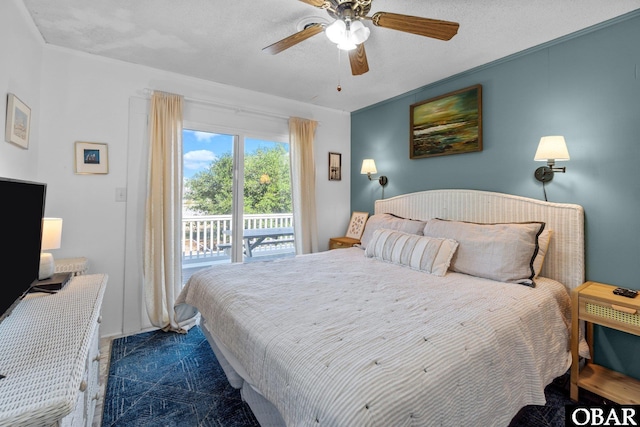 1017 Corolla Dr Lot 52, Corolla, NC 27927 - bedroom with access to outside and ceiling fan