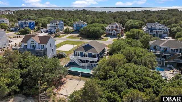 1017 Corolla Dr Lot 52, Corolla, NC 27927 - aerial perspective of suburban area with a pool and a forest