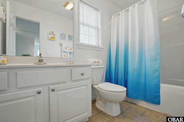 184 Tabernacle Ln, Aydlett, NC 27916 - bathroom featuring vanity, stone finish flooring, and shower / bathtub combination with curtain