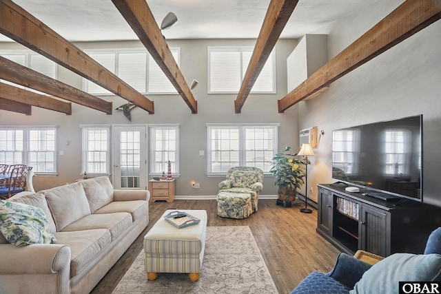 184 Tabernacle Ln, Aydlett, NC 27916 - living room featuring beam ceiling, high vaulted ceiling, and wood finished floors