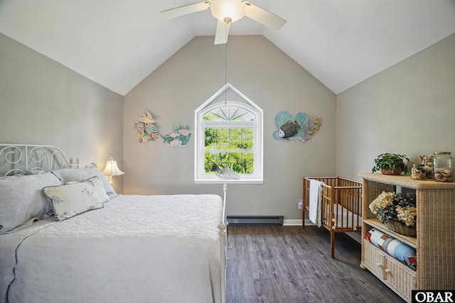 184 Tabernacle Ln, Aydlett, NC 27916 - bedroom with baseboard heating, dark wood-style flooring, vaulted ceiling, and a ceiling fan