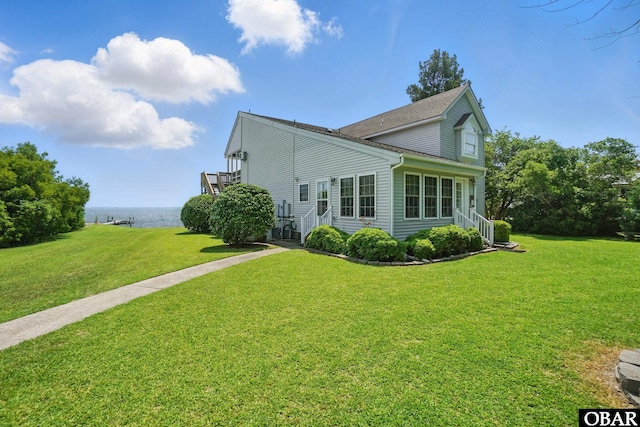 184 Tabernacle Ln, Aydlett, NC 27916 - view of side of property with a lawn and a water view